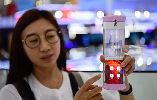 A smart cup is displayed during the Digital China Exhibition